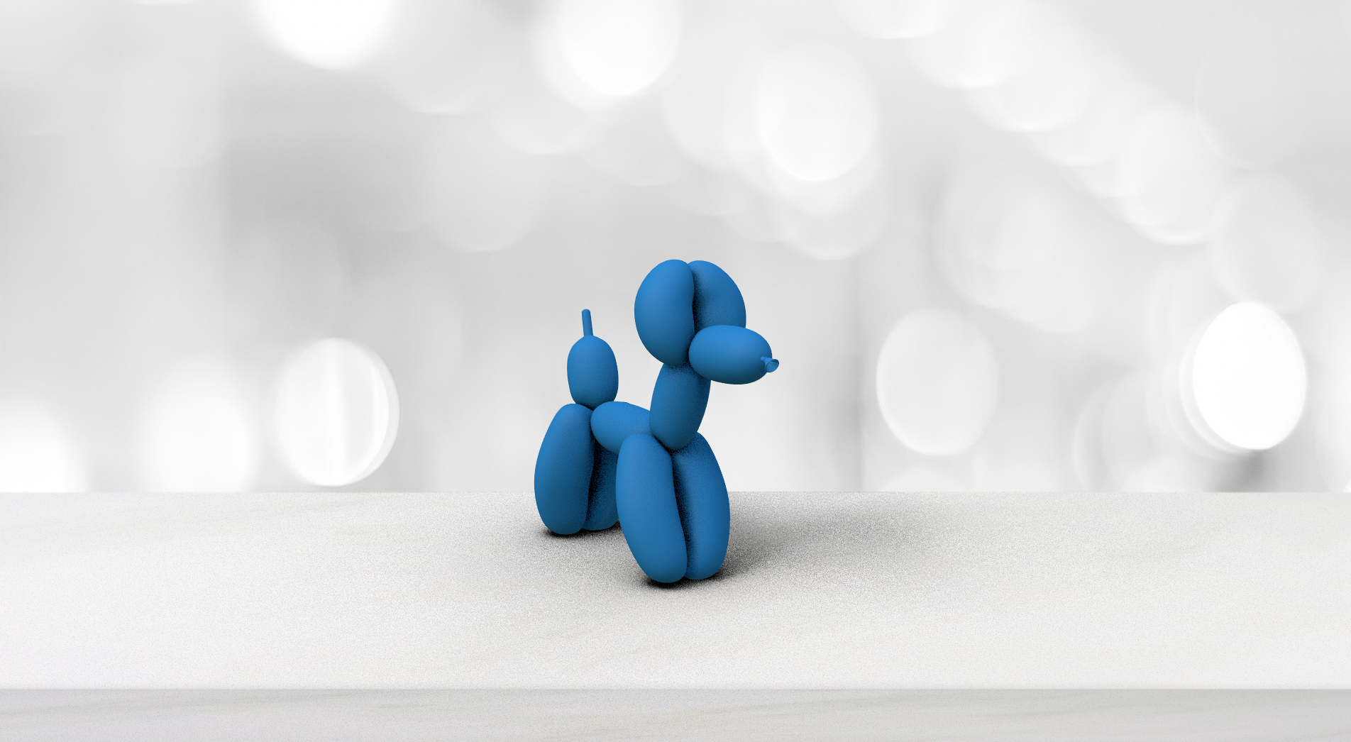 A layer with balloon animal 3D model with table in the background.  The solid 3D layer is enabled as shadow catcher layer and it is not visible but accepting shadows.