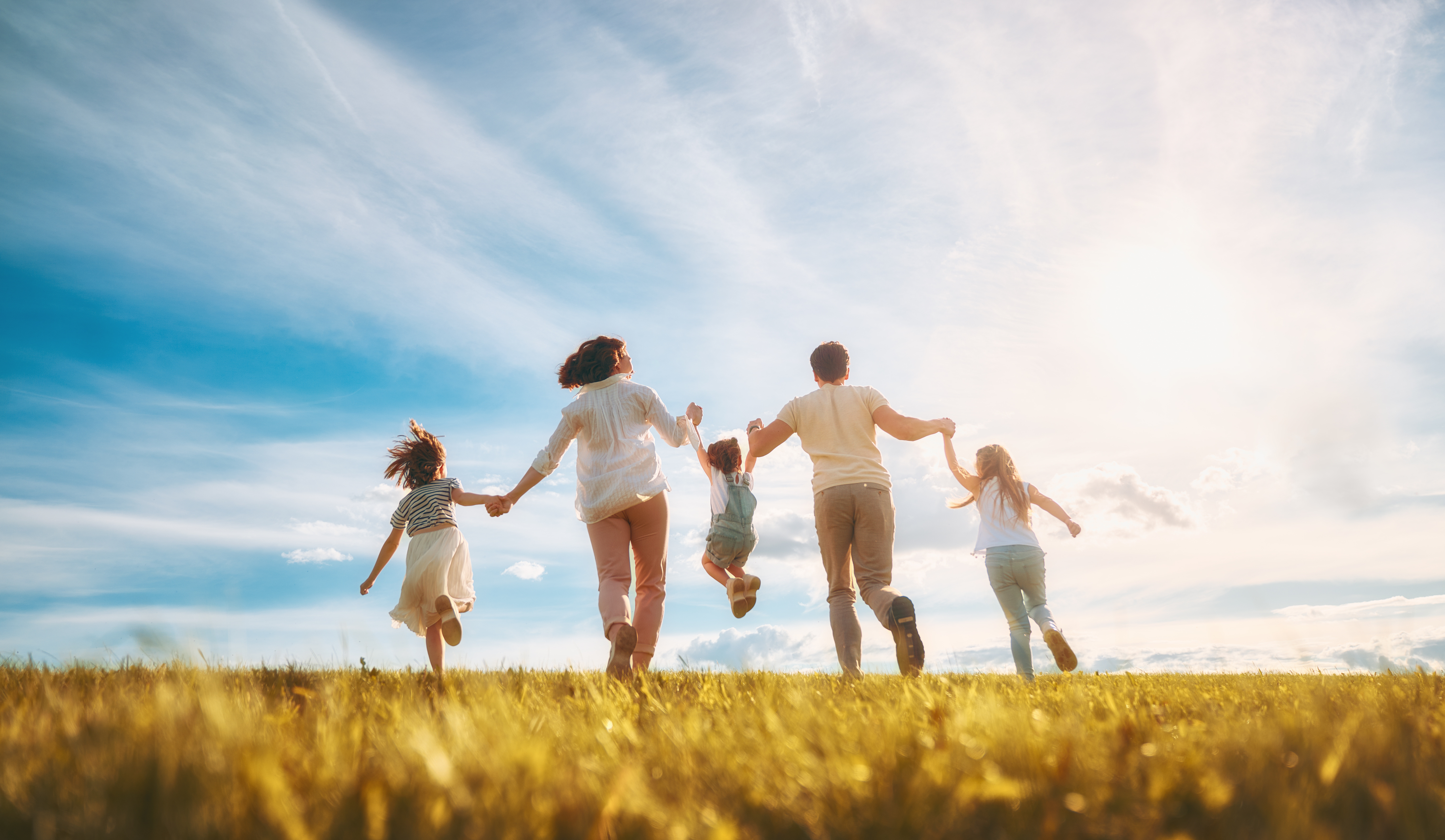 Happy family on summer walk