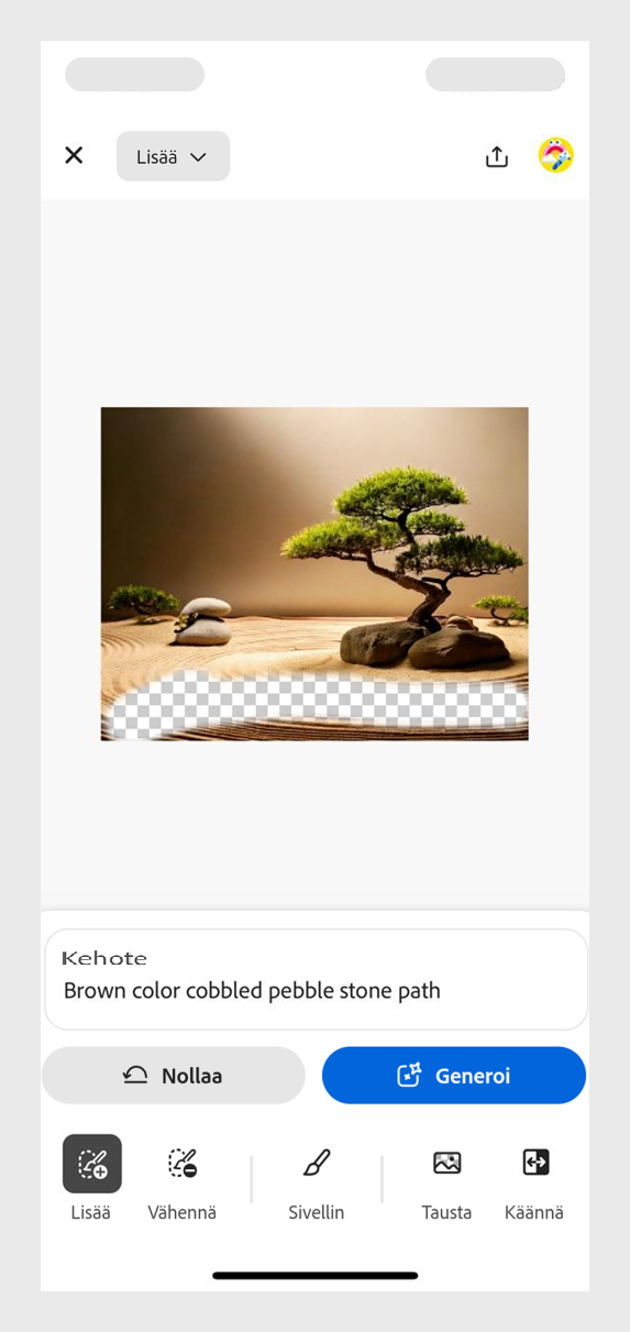 Kuvassa on zen-puutarha, jossa on hiekkaa, puu ja pensas sekä pino ruskeita sileitä kiviä. Sivellintyökalulla luodaan tyhjä tila uusien elementtien lisäämistä varten.