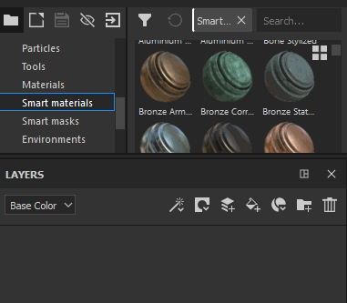 Drag a Smart Material from the Asset Panel into the Layer Stack